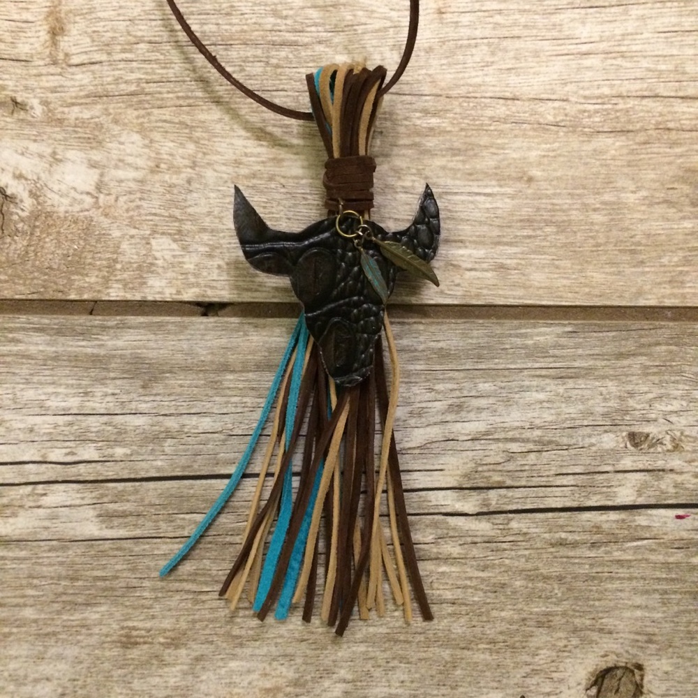 Western bull skull and feathers tassel